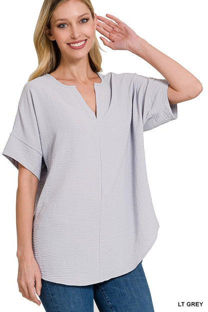 WOVEN AIRFLOW SPLIT NECK SHORT SLEEVE TOP