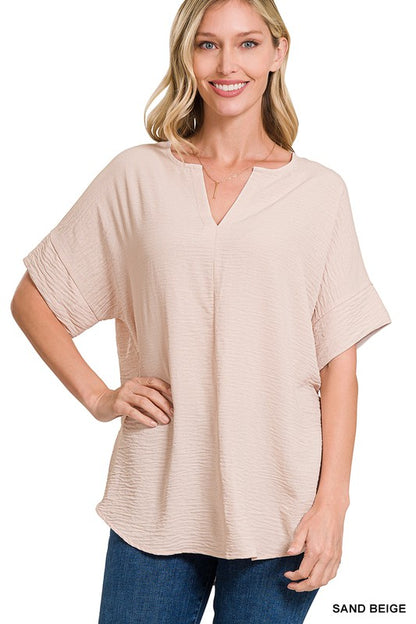 WOVEN AIRFLOW SPLIT NECK SHORT SLEEVE TOP