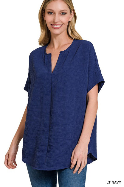 WOVEN AIRFLOW SPLIT NECK SHORT SLEEVE TOP