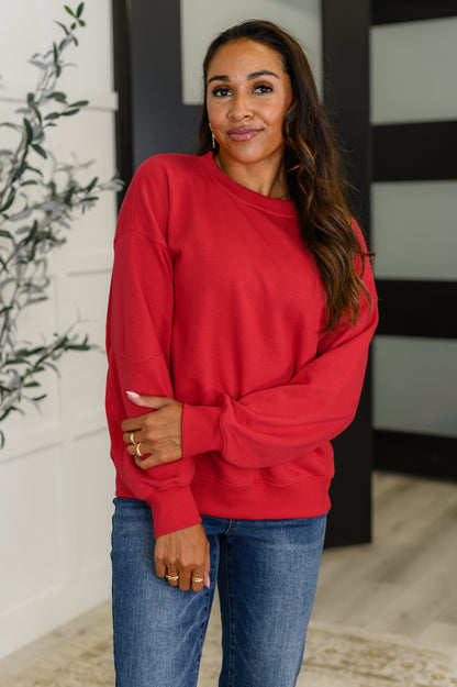 Sweet with a Side Eye Drop Shoulder Pullover in True Red