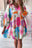 White Puff Sleeve Tied Split Neck Colorful Floral Flowy Dress